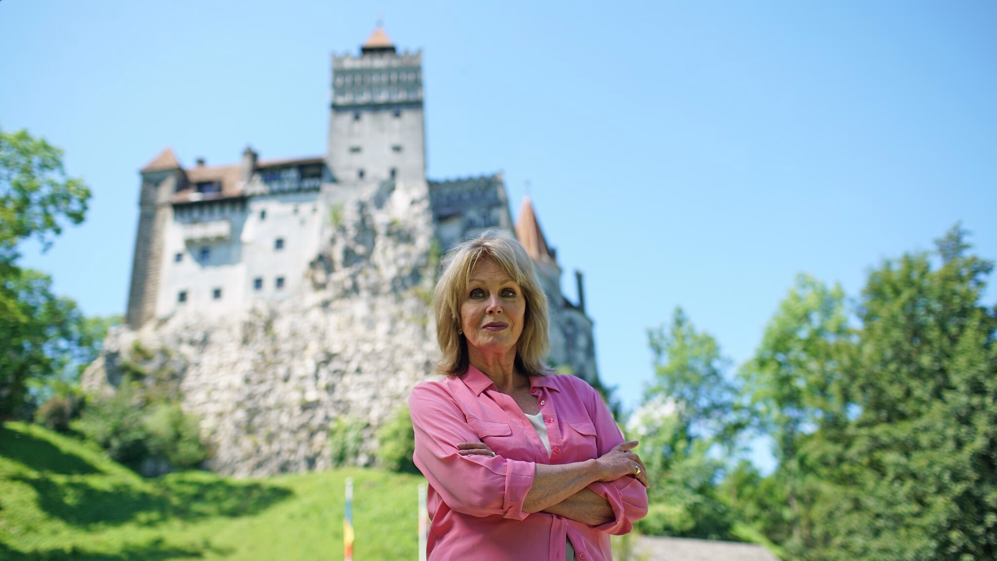 Presenter Joanna Lumley in front of Bran Castle, Romania